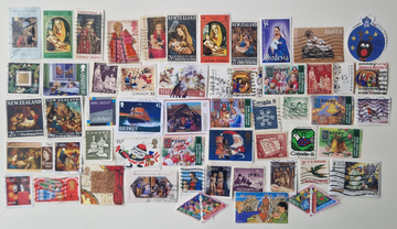 Discover the Global Charm of Christmas Stamps at US Postage Stamps Co.